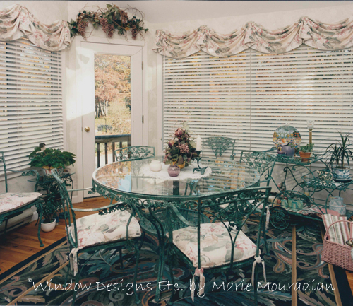 Garden Room in Holden, MA Bring spring indoors. Wrought iron furniture, Hunter Douglas Wood Blinds, light pink and shades of green