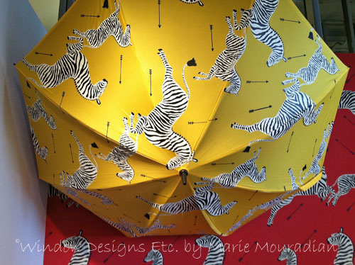 Scalamandré Zebra Umbrella. Zebras dancing across a yellow background. See more at www.windowdesignsetc.com by Marie Mouradian