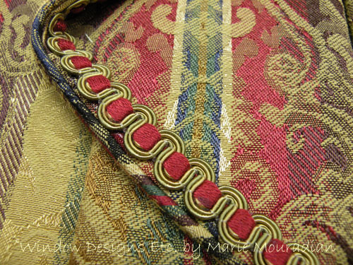 Detailed edge of a custom window treatment - red and gold. Custom window treatment details See more at www.windowdesignsetc.com by Marie Mouradian