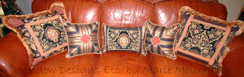 Custom pillows in gold, black and rust. Decorative trim and fringe. Custom pillows are the essential accessory to home decor. Visit the blog WindowDesignsEtc.com Marie Mouradian