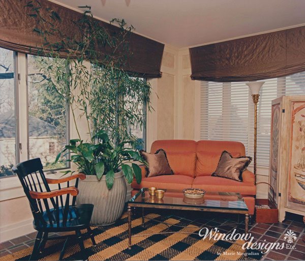 Worcester garden room with brown silk relaxed Roman shades and Hunter Douglas Silhouette