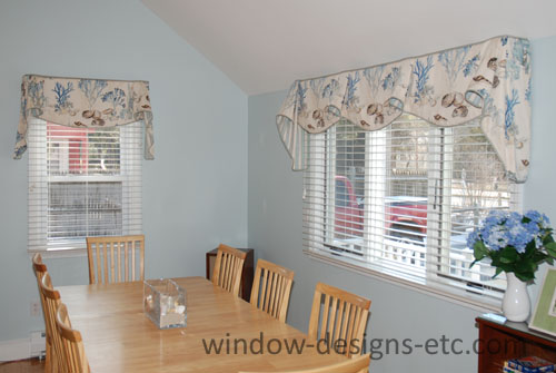 Cape Cod dining room with white alternative wood Hunter Douglas blinds and custom beach theme valance. See more on www.windowdesignsetc.com by Marie Mouradian
