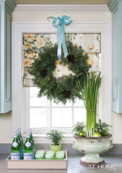 Holiday window ideas. Wreath over Roman shade with Christmas balls in a planter. More beautiful windows decorated for Christmas here http://demo2.coolhatwebdesign.com/