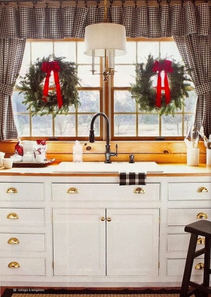 Holiday window ideas. The same window with a different window treatment of black check curtains with wreaths. More beautiful windows decorated for Christmas here http://demo2.coolhatwebdesign.com/