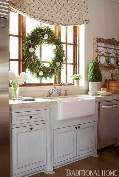 Holiday window ideas. Relaxed Roman shade with Christmas wreath over a farmhouse sink. More beautiful windows decorated for Christmas here http://demo2.coolhatwebdesign.com/