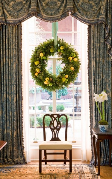 Stately custom drapes and valance are ready for Christmas window decorating with a fruit wreath. More on the blog www.windowdesignsetc.com