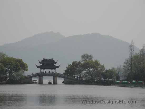 Pagoda bridge on West Lake in Hangzhou, China. Contact WindowDesignsEtc.com for further information. Springtime in China. See more on my blog www.windowdesignsetc.com - Marie Mouradian