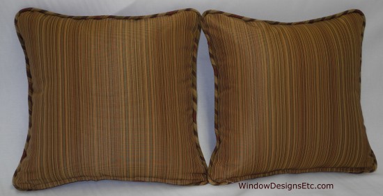 Custom decorative stripe pillows by Marie Mouradian. Narrow brown, rust and green stripe pillows with welt. This is the back side. Contact WindowDesignsEtc.com for further information