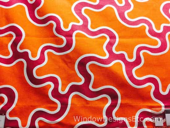 Orange and Pink curvy shaped fabric from Kravet at the Boston Design Center. Marie Mouradian www.WindowDesignsEtc.com