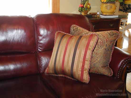 Tones of Marsala Pantone 2015 Color of the year in this leather sofa are brought out with the custom accent pillows. Rich gold is a natural partner to Marsala. - Marie Mouradian WindowDesignsEtc.com - Marsala, Pantone 2015 Color of the Year
