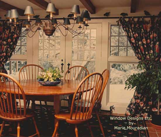 Decorating with black floral chintz tied tab panels in a dining room - See more at www.WindowDesignsEtc.com by Marie Mouradian