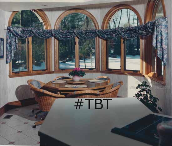 TBT Northborough Massachusetts bay window treated with draped or throw swags wrapped around a fabric shirred PVC pole Circa 1989
